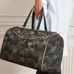 Stella and Dot Lady boss bag. Folds fully open to hanging garment bag!